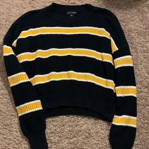 black and yellow sweater